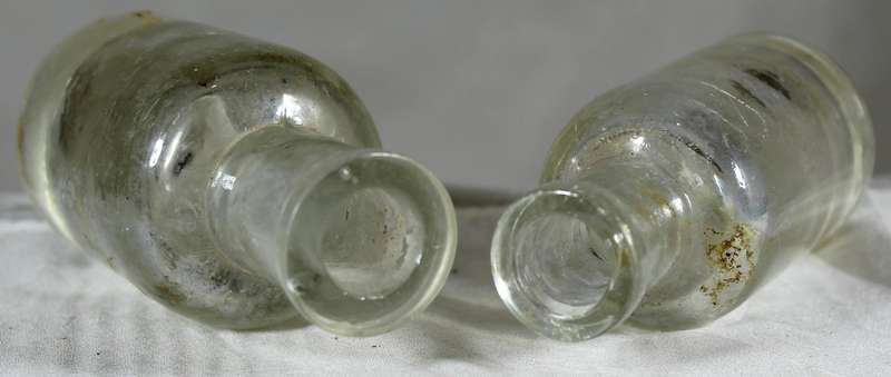 Pair of glass vintage bottles