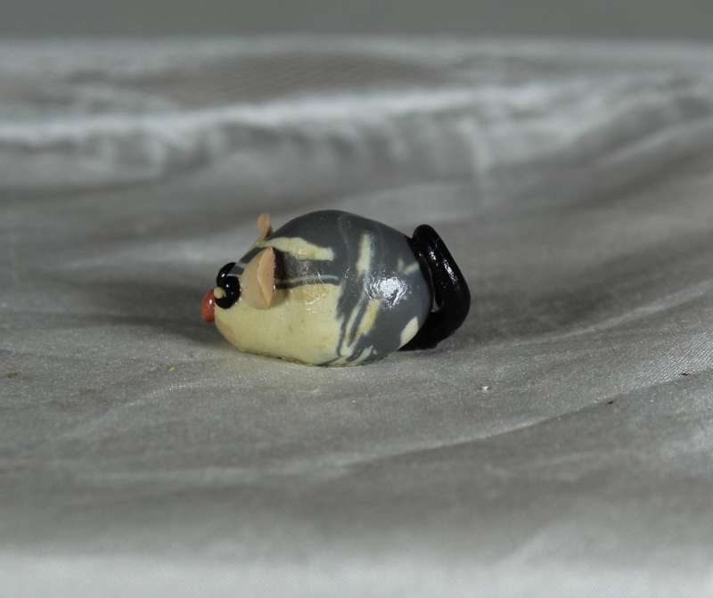 Mini miniature grey and white mouse