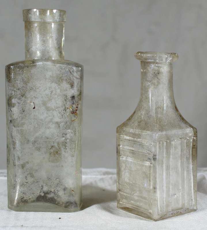 Pair of glass vintage bottles