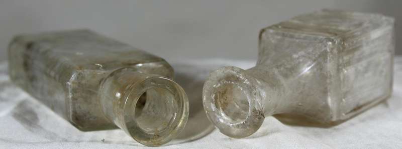 Pair of glass vintage bottles