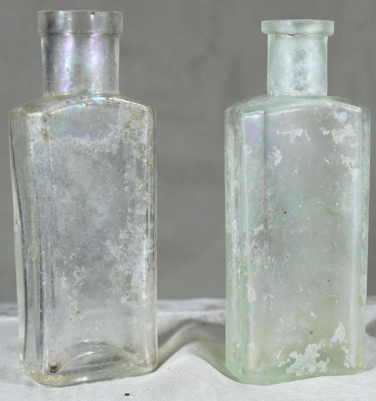 Pair of glass vintage bottles