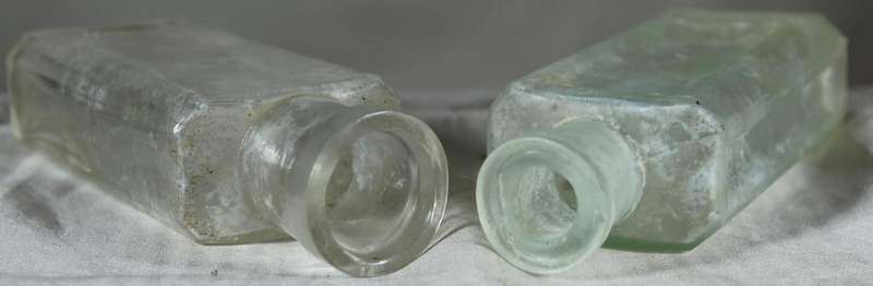 Pair of glass vintage bottles
