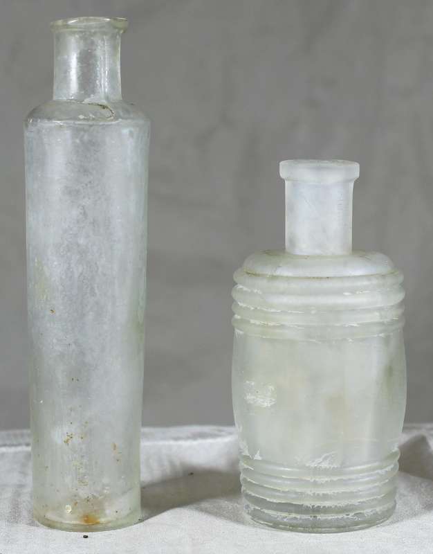 Pair of glass vintage bottles