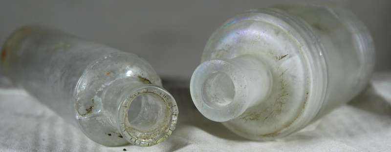 Pair of glass vintage bottles