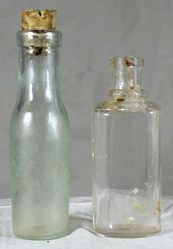 Pair of glass vintage bottles