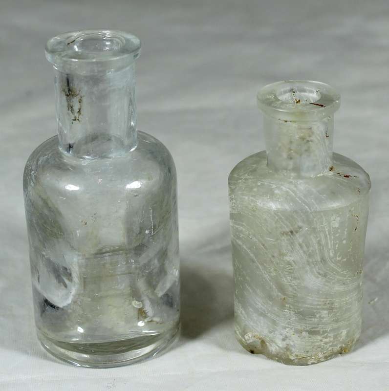 Vintage glass bottle pair