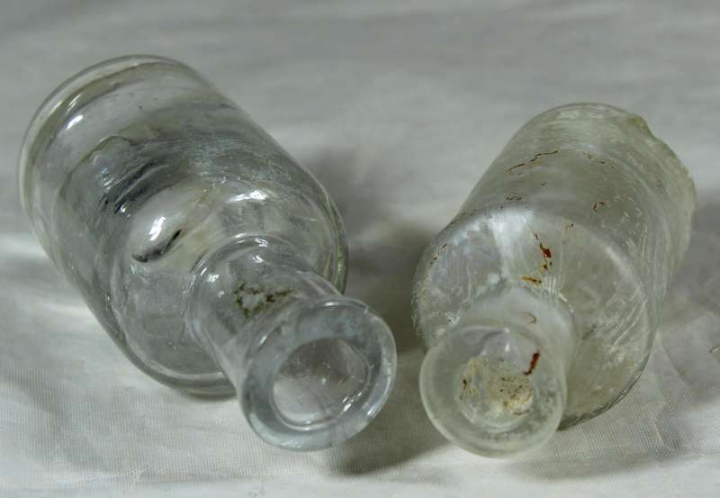 Vintage glass bottle pair