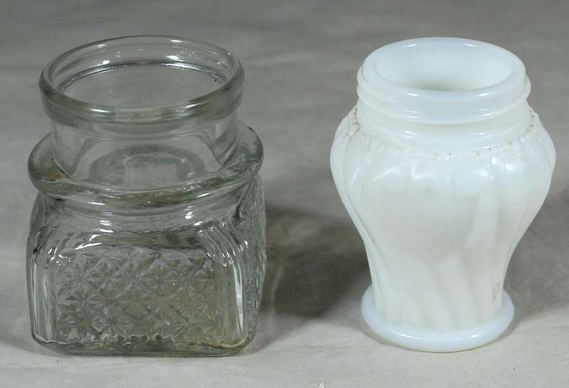White glass bottle plus pressed glass bottle
