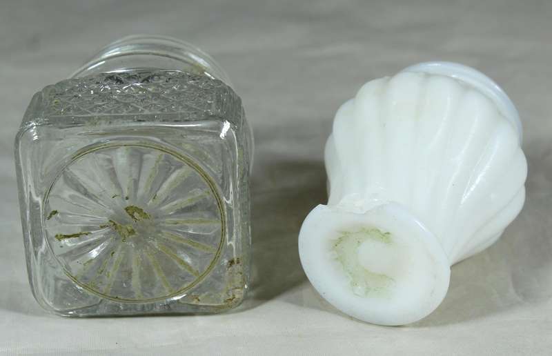 White glass bottle plus pressed glass bottle