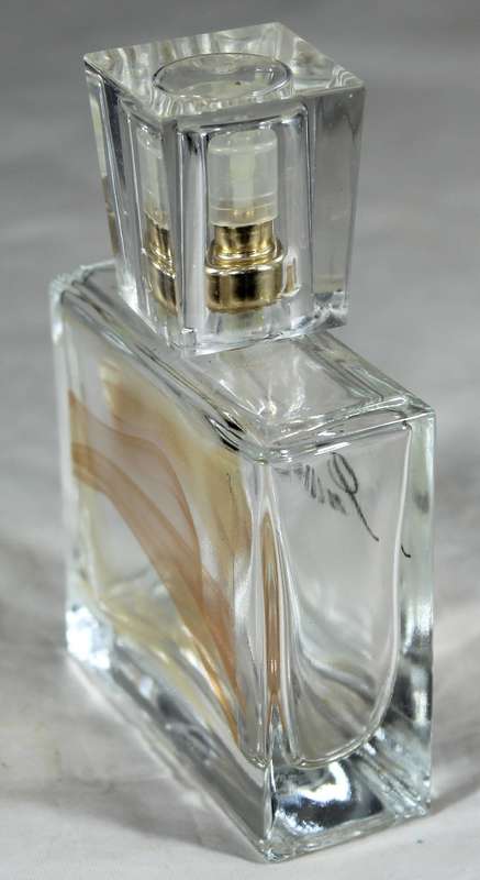 Perfume bottle - Avon Incandessence