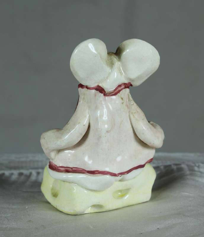 Small mouse on a slice of cheese - signed Karen