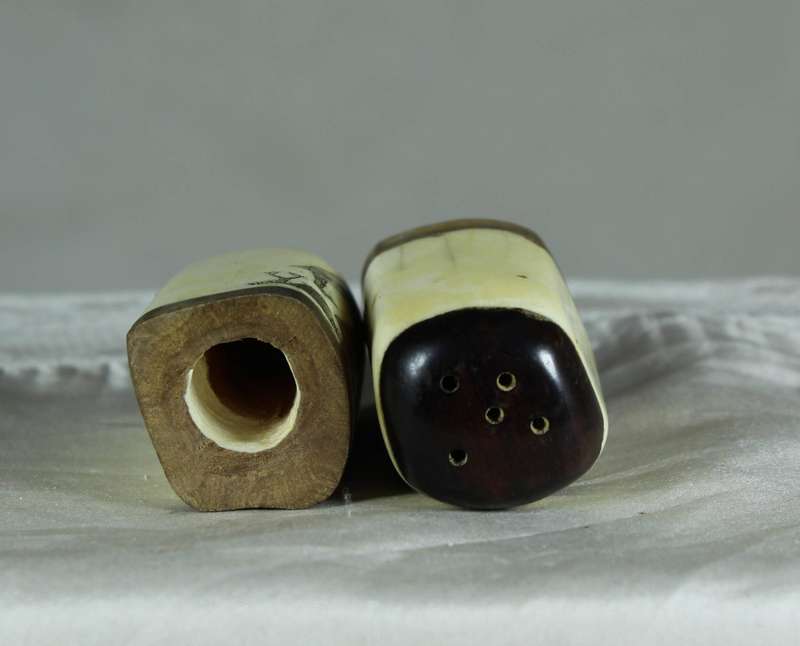 Bone salt & pepper set with engraved elephant motif