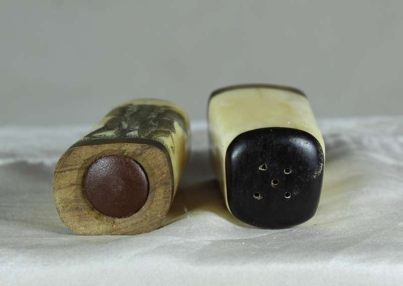 Bone salt & pepper set with engraved elephant motif
