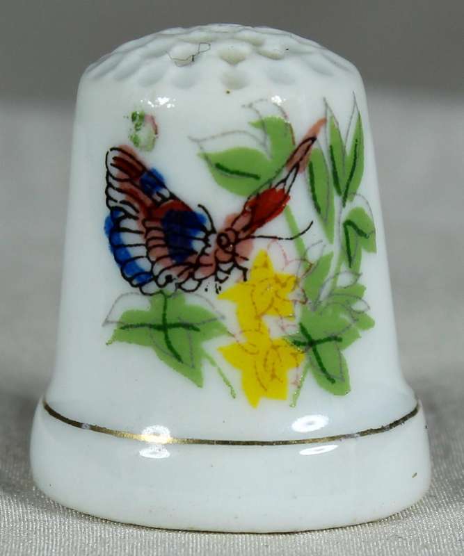 Bone China thimble - butterfly on yellow flowers