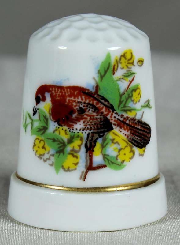 Bone China thimble - bird on yellow flowers
