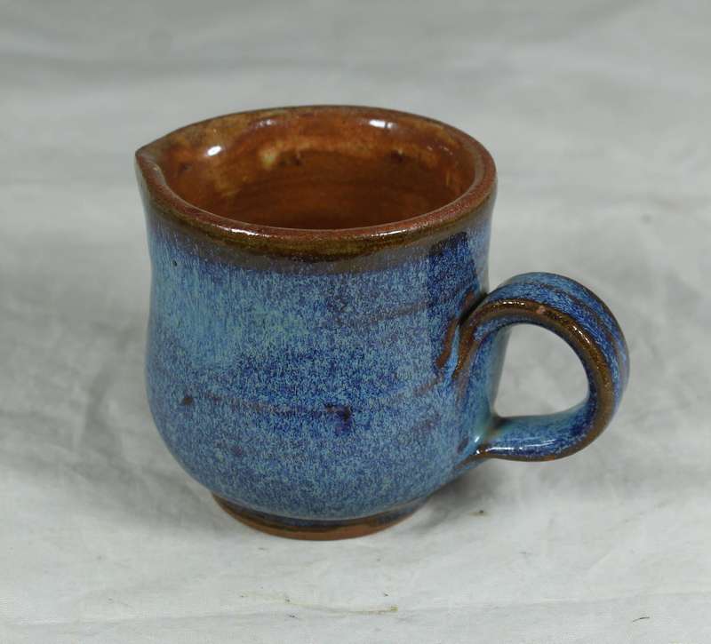 Small pottery milk jug