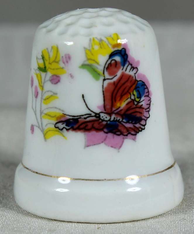 Bone China thimble - butterfly on yellow flowers