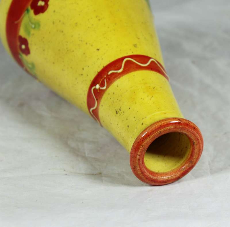 Conical vase with embossed flowers
