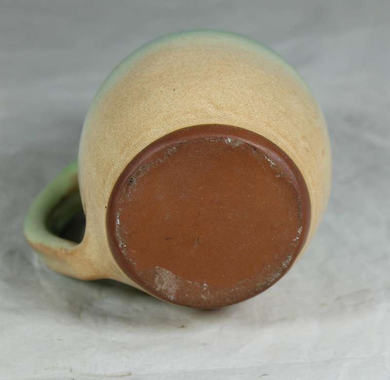 Glazed oil pitcher