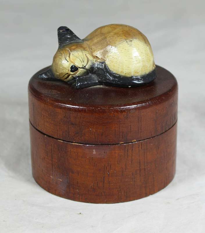 Trinket bowl with cat sleeping on lid