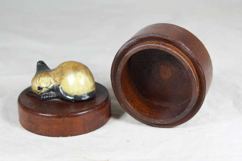 Trinket bowl with cat sleeping on lid