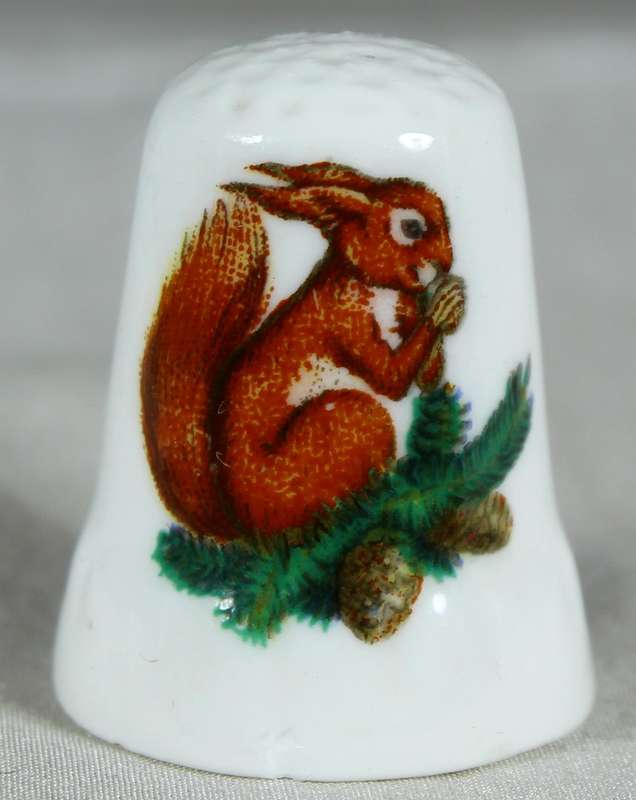 Bone China thimble - Squirrel eating a nut