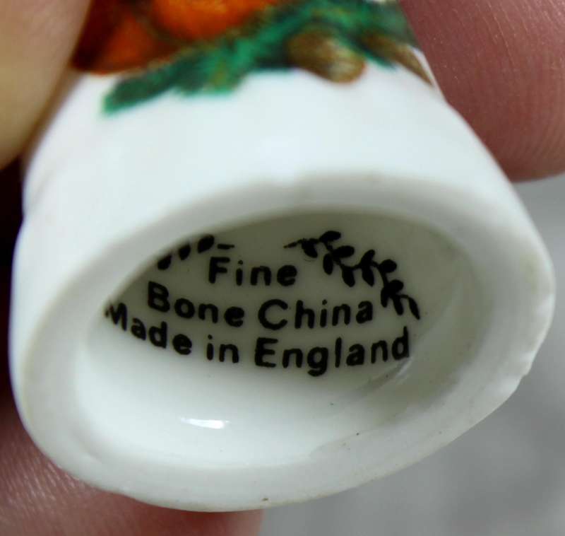 Bone China thimble - Squirrel eating a nut