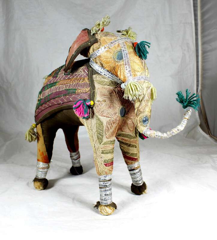 Hand made paper mache elephant, extensively covered and adorned