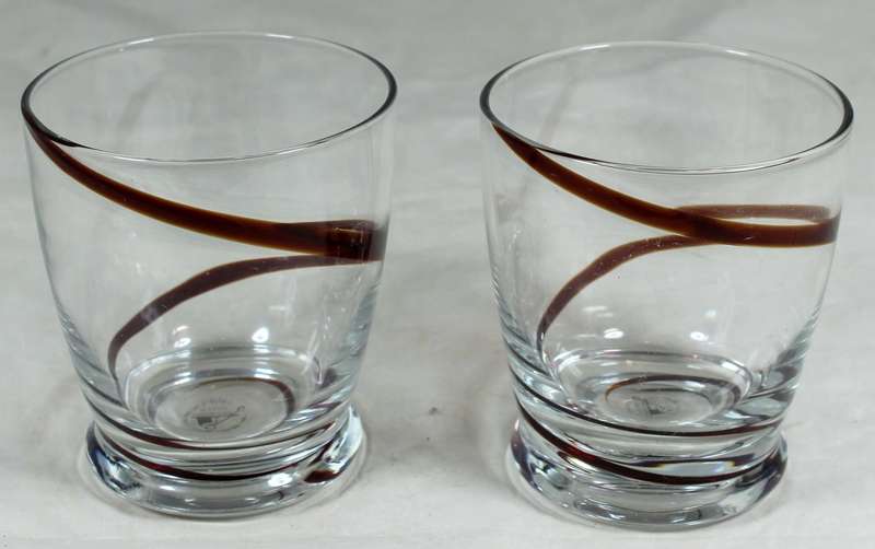 Pair of hand-blown glasses with brown swirl pattern
