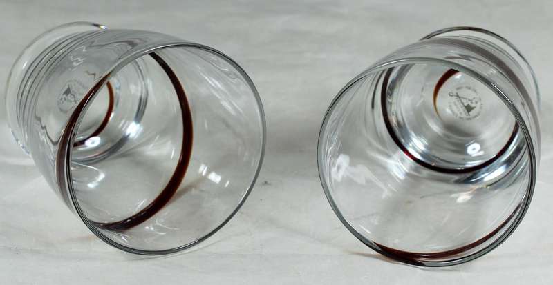 Pair of hand-blown glasses with brown swirl pattern