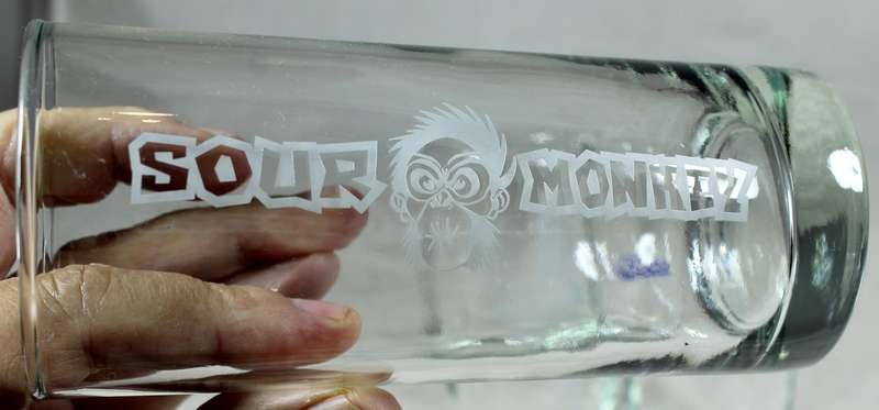 Pair of Sour Monkey glasses with on Oreo glass