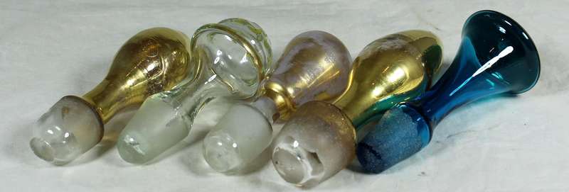 Set of five decanter tops