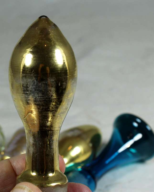 Set of five decanter tops