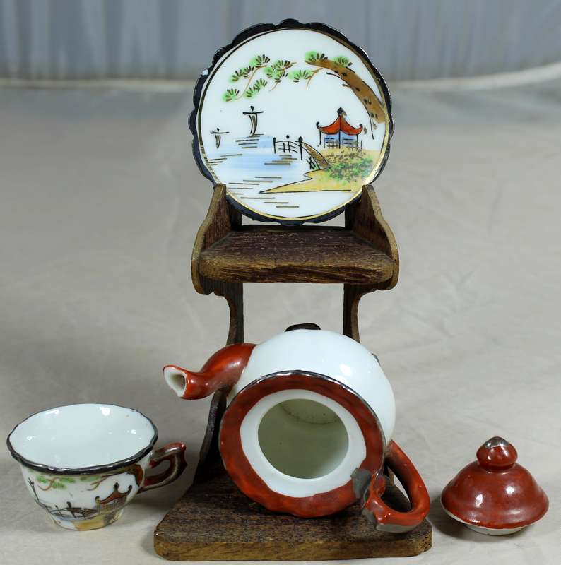Miniature Chinese tea set on stand