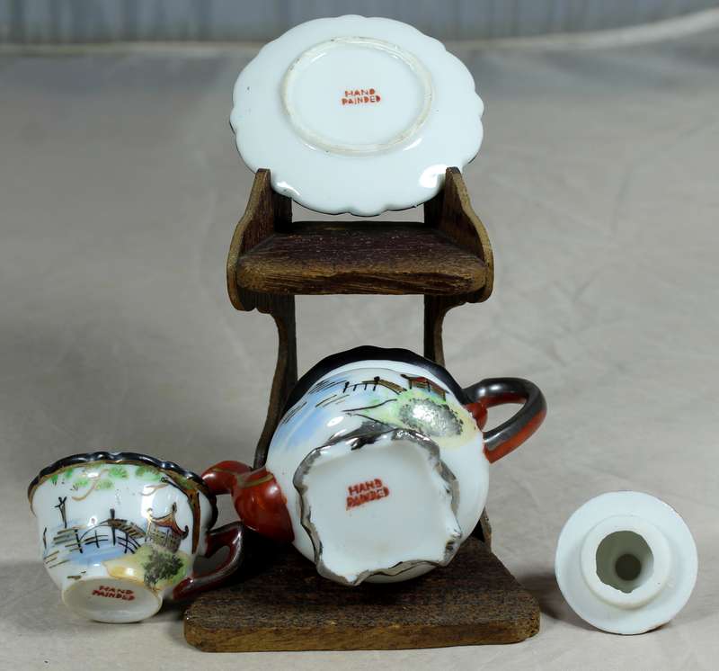 Miniature Chinese tea set on stand