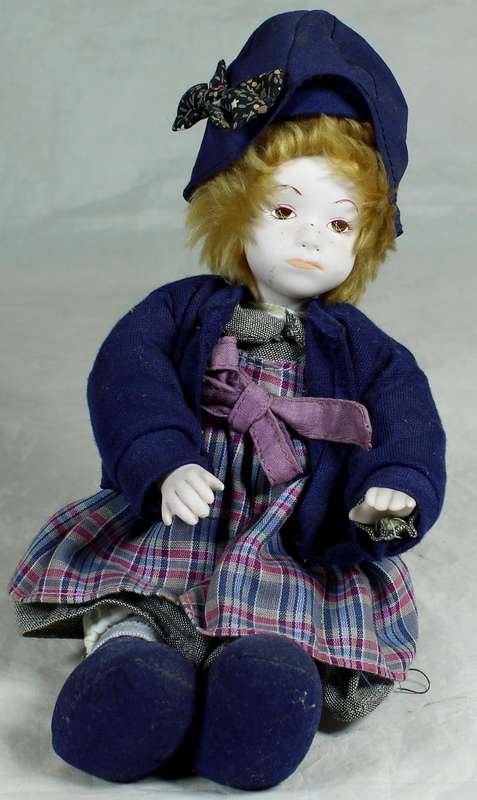 Little porcelain girl in retro clothing