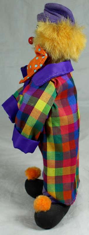 Smiling clown in multi color jacket