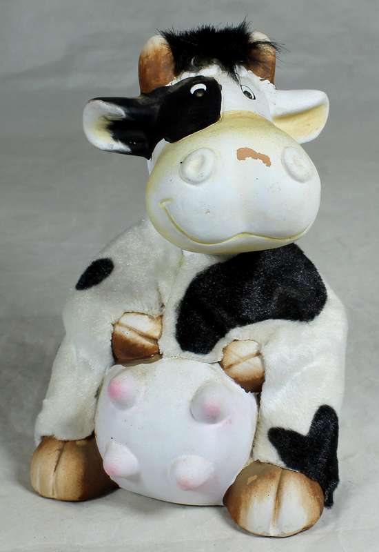 Seated cow with satin feel jacket money box