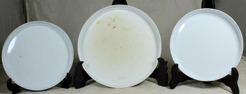 Three cow themed stove top covers