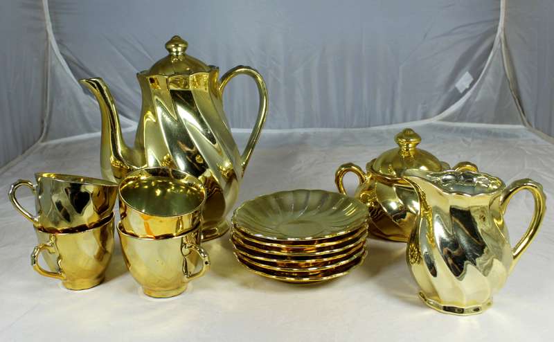 Set of gold colored China coffee set
