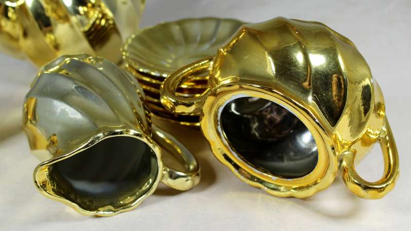 Set of gold colored China coffee set