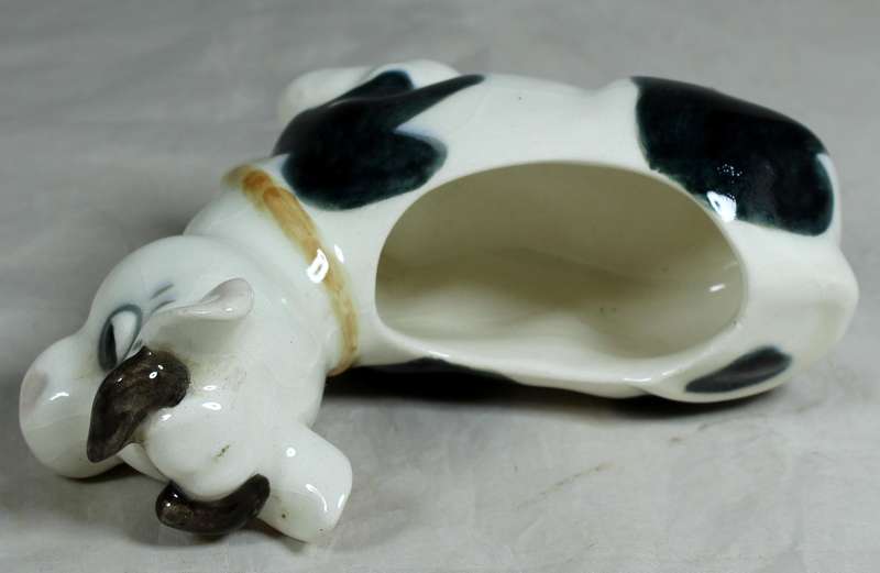 Cow laying down trinket holder