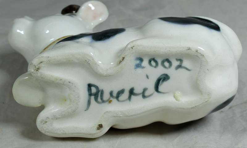 Cow laying down trinket holder