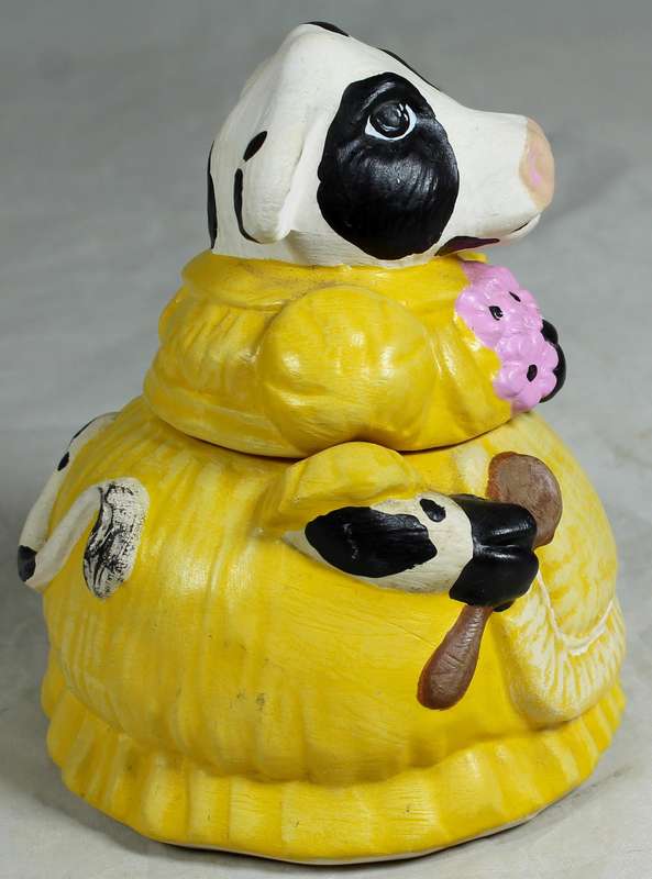 Cow holding flowers lidded trinket bowl