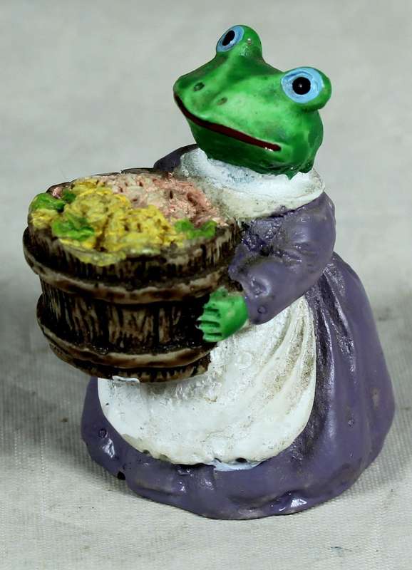 Miniature mamma frog with a bushel of flowers
