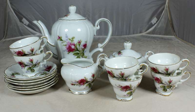 Roses on white coffee set