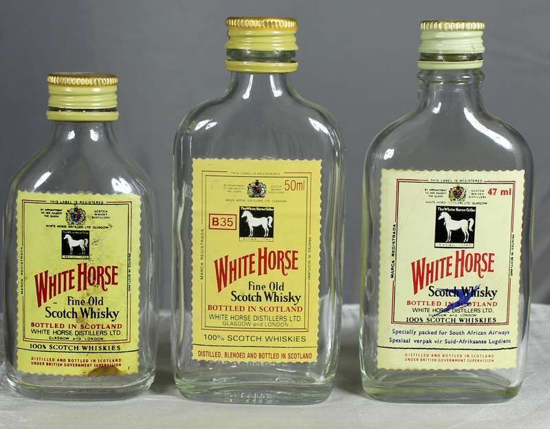 Empty liquor bottles - Trio of White Horse whisky