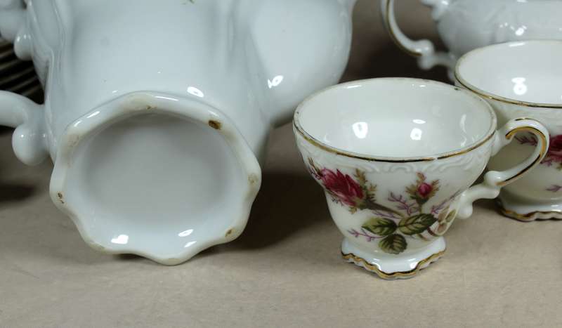 Roses on white coffee set