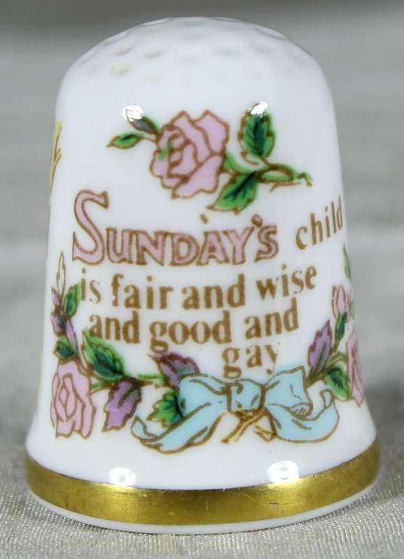 Bone China thimble - Sunday's Child - Caverswall