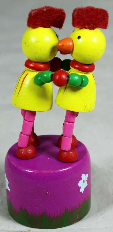 Dancing chickens with push mechanism